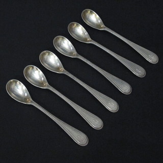 6 Victorian silver long handled salt spoons, Sheffield 1870, with bead work decoration, the bowls engraved vinery, 3 1/2 ozs