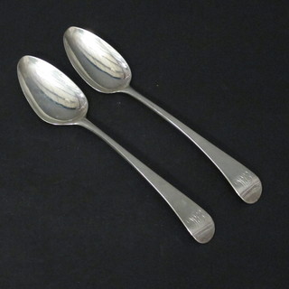A pair of George III silver fiddle pattern pudding spoons London 1789 2 ozs