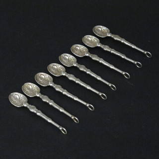 8 miniature silver anointing spoons