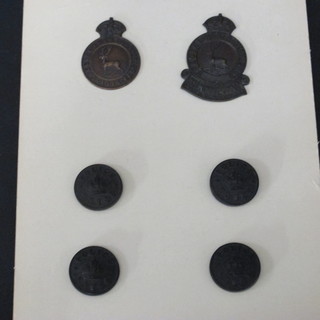 A Herts 1914 Special Constabulary lapel badge together with a Hertfordshire County Long Service Special Constabulary badge  and 4 Police raincoat buttons