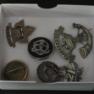 A silver and piquet Middlesex Regt. sweetheart brooch, 2 Canadian Sweetheart brooches, a Bedfordshire Regt. sweetheart  brooch, an Artist Rifles button mounted as a sweetheart brooch  and 1 other sweetheart brooch