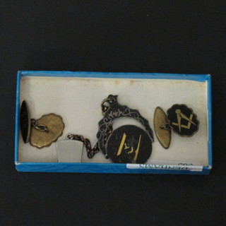 A pair of Niello Masonic cufflinks marked 910, a Masonic  pendant and silver keystone shaped pendant
