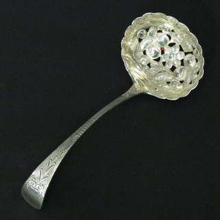 A Victorian engraved pierced silver sifter spoon, London 1876