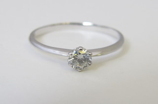 An 18ct solitaire dress/engagement ring set a diamond approx 0.40ct