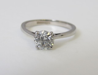 A lady's 18ct white gold dress/engagement ring set a solitaire diamond, approx 0.98ct,