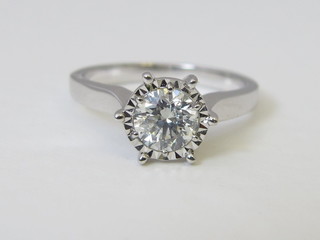 An 18ct white gold solitaire dress ring, approx 0.90ct