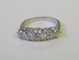 A lady's 18ct white gold dress/engagement ring set 5 diamonds,  approx 1.40ct