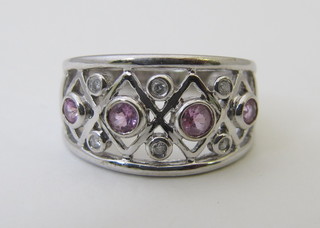 A 9ct gold dress ring set pink sapphire and diamonds