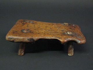 A rectangular Oriental hardwood stool 12"