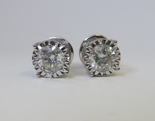 A pair of 18ct white gold diamond set ear studs with screw  backs, approx 1.51ct
