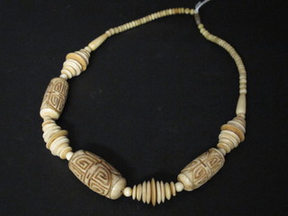 An Eastern carved necklace