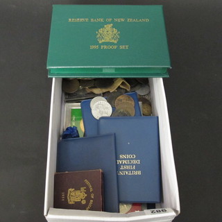 A 1985 proof set of New Zealand coins and other coins