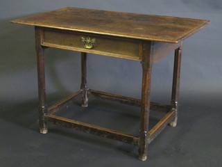 A 17th/18th Century oak side table fitted a drawer and raised on turned and block supports with stretcher 14"