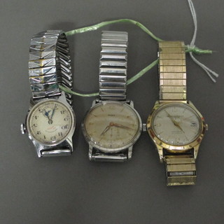 A Baume & Mercier wristwatch contained in a gilt case, a Mira wristwatch and 1 other contained in a stainless steel case