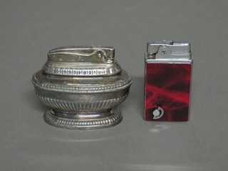 A Ronson Queen Anne style table lighter and a musical table  lighter