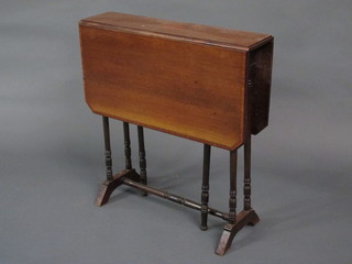 An Edwardian inlaid mahogany Sutherland table, raised on  turned supports 24"