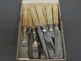 A set of 6 Victorian silver plated fruit knives and forks with ivory handles