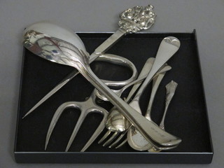 A silver plated breadknife and a small collection of flatware