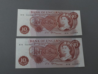 2 red 10 shilling notes