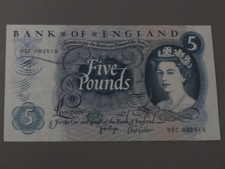 A green œ5 note serial number 95C092515