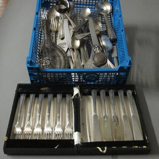 A set of 6 silver plated fish knives and forks, a silver backed handmirror, a cut glass dressing table jar with silver lid and a  collection of various flatware