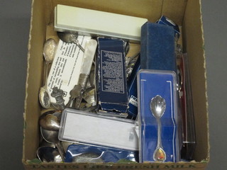 A collection of souvenir teaspoons