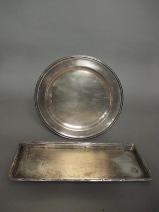 A rectangular silver plated platter 12" and a circular silver plated platter 16"
