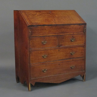 A Georgian honey oak bureau the fall front with well and fitted above 2 short and 2 long drawers with brass swan neck drop  handles, raised on bracket feet 37"