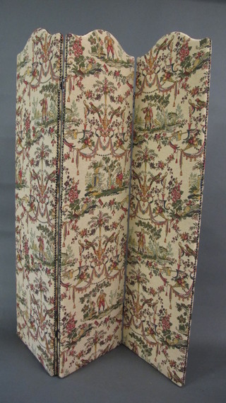 A fabric covered 3 fold dressing screen