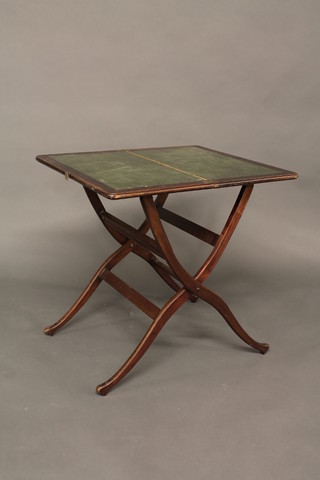 A 19th Century rectangular mahogany folding campaign/coaching  table with inset leather writing surface 24"