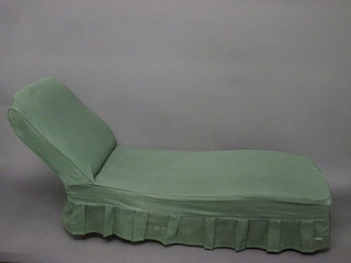 A Victorian mahogany framed day bed with green loose cover  57"