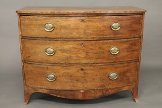 A Georgian mahogany bow front chest of 3 long drawers with  rosewood crossbanding and satinwood stringing, raised on  splayed bracket feet 43"  ILLUSTRATED