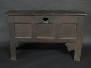 An 18th Century elm coffer of panelled construction with hinged lid 44"