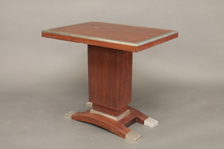 A rectangular "Designer" mahogany and chrome banded table  raised on a tapering pedestal 29"