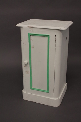 A Victorian turquoise and green painted pot cupboard enclosed  by a panelled door 17"
