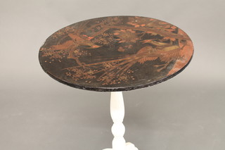 A circular lacquered and white painted wine table, the top decorated birds, raised on a pillar and tripod base 21"