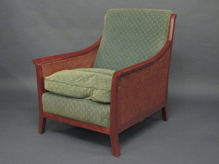 A pair of modern mahogany framed double cane bergere  armchairs