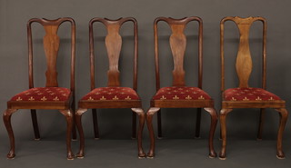 A set of 6 Queen Anne style mahogany slat back dining chairs  with upholstered drop in seats, on cabriole supports