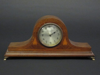 A bedroom timepiece with silvered dial and Arabic numerals  contained in an inlaid mahogany Admiral's hat shaped case by  Dyson Sons of Leeds