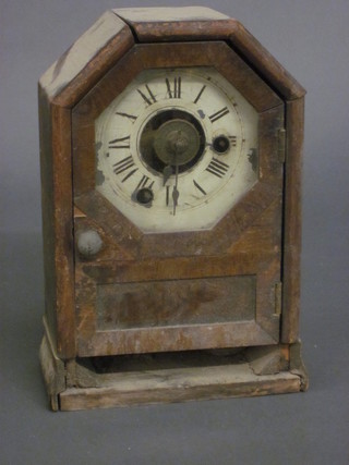 An American wall clock with arched painted dial contained in a  walnut finished case