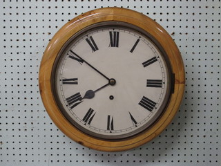 A Continental wall clock with 12" painted dial contained in a  pine case