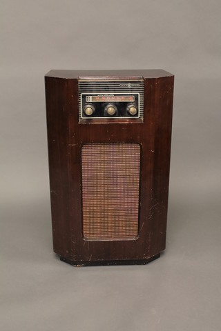An Ekco E radio contained in a mahogany case and an Ecko  model C273 complete with instructions