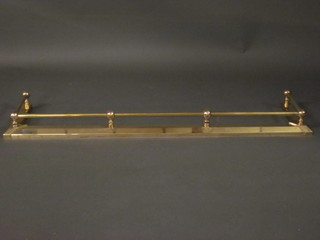 A brass railed fire curb 51"