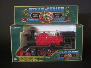 A Echo steam engine with smoke effect, boxed