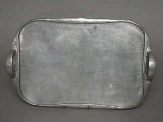 A Liberty's oval planished pewter tea tray, the base marked English Pewter Made by Liberty 043 18"
