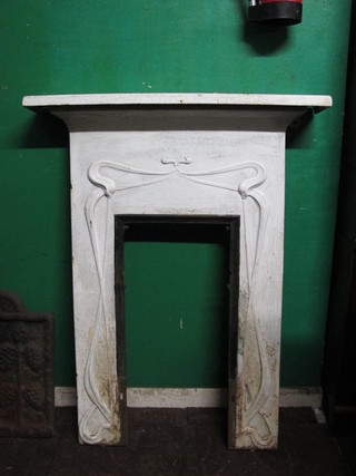 An Art Nouveau cast iron fire place insert 36"