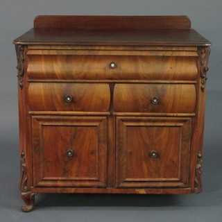 A 19th Century Continental walnut chest of 1 long and 2 short drawers above a double cupboard, raised on squat cabriole  supports 32"