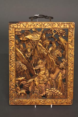 A pierced carved gilt wood Oriental plaque 11"