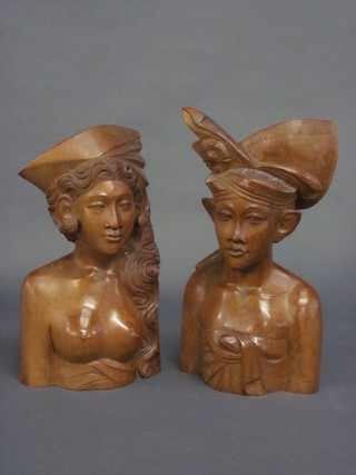 A pair of carved Balinese portrait busts - Lady and Gentleman 12"