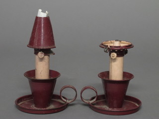 A pair of Alladinette paraffin candle holders with  original sales leaflet